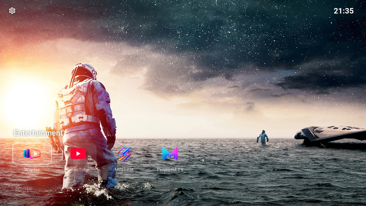 An example home screen with a compact app row and cinematic backdrop
