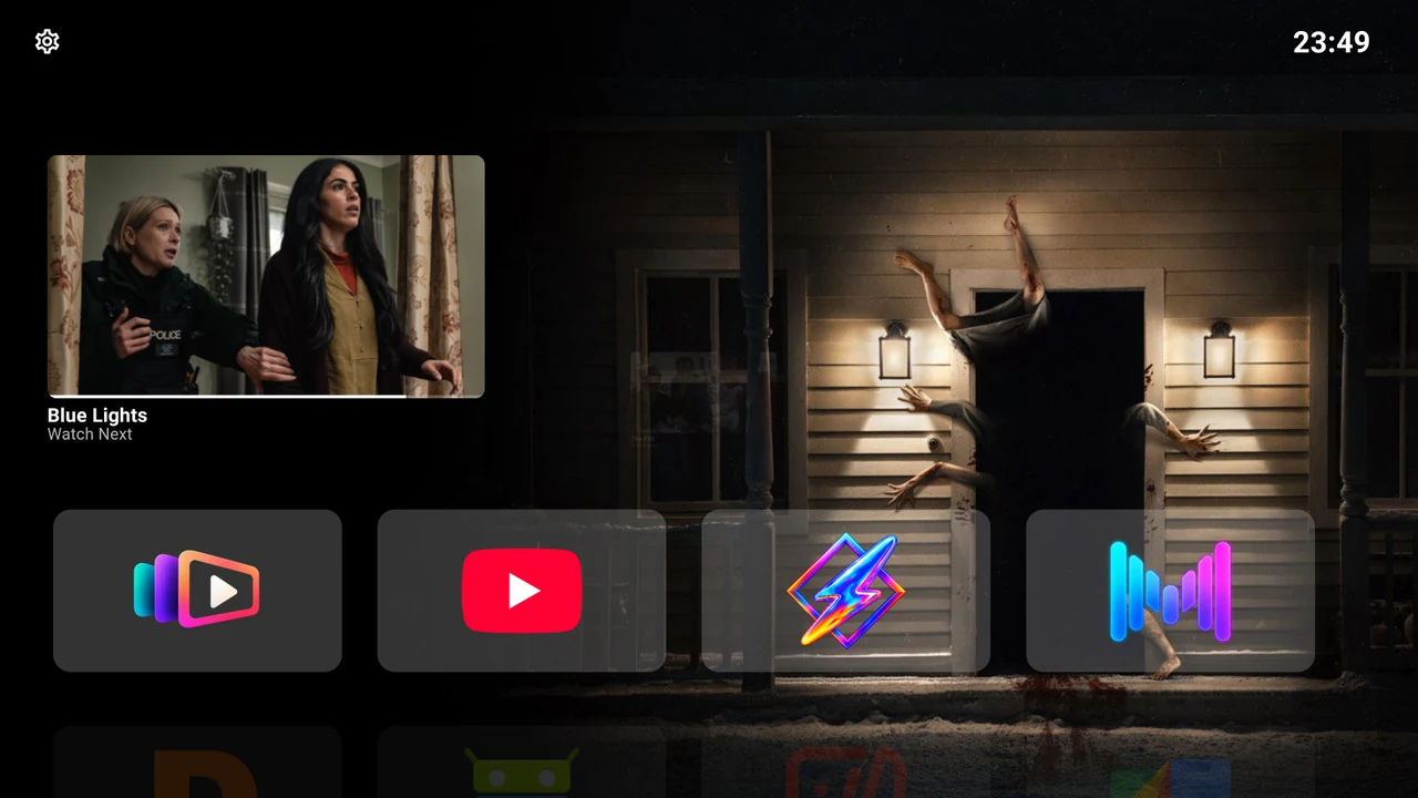 Backdrop Launcher home with Continue Watching, cinematic artwork and a compact app row